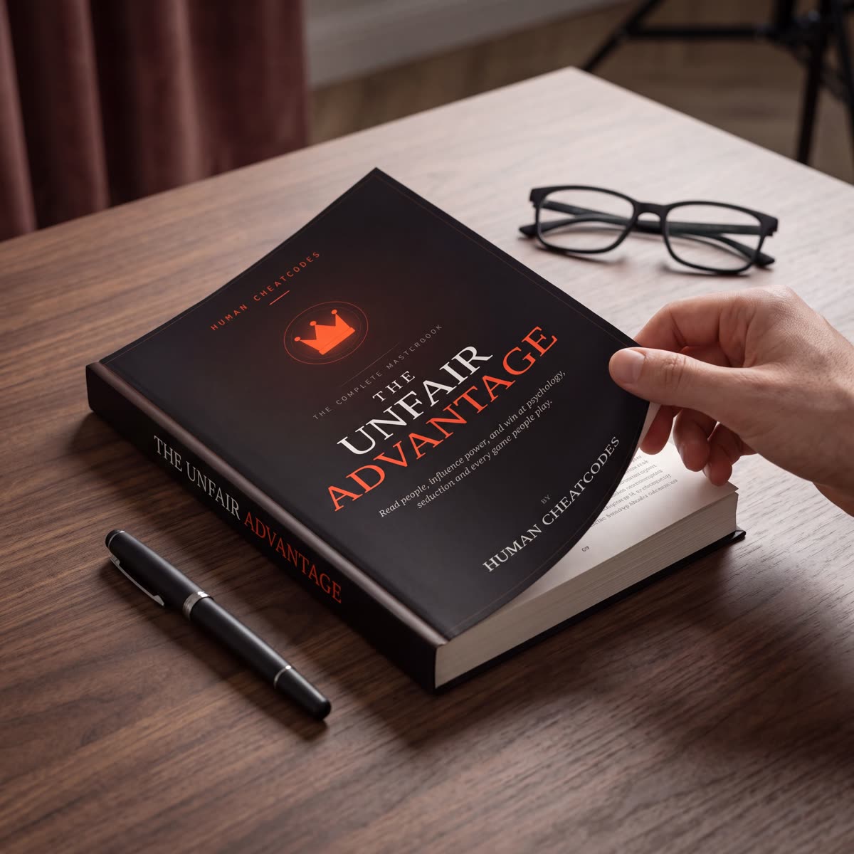 The Unfair Advantage open on a desk
